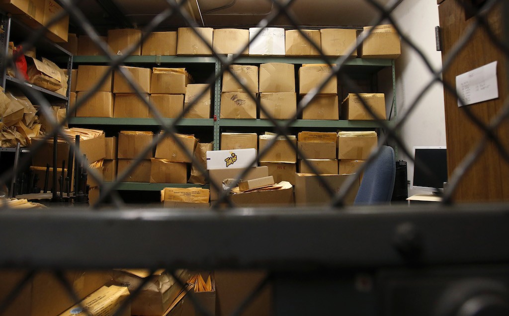 Stacks of boxes filled with evidence are securely locked up  in the Garden Grove PD's evidence locker at the police station. Photo by Christine Cotter