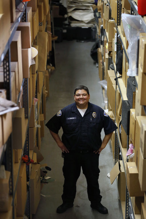 Eric Quintero, senior community services officer in Property and Evidence works at the Garden Grove PD's massive evidence storage facility.  Photo by Christine Cotter