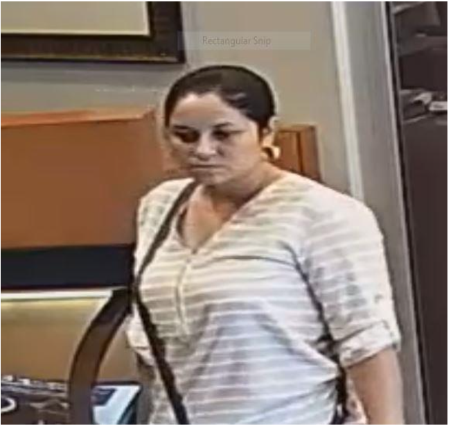 Tustin PD are looking for this woman who is suspected of distracting a jewelry store employee to steal an $8,000 watch. Photo courtesy Tustin PD. 
