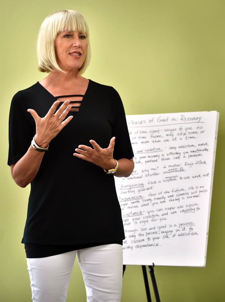 Kristi Hugstad talks about the Phases of Grief in Recovery as she leads a group session at Reflections Recovery in Fountain Valley for recovering addicts on grieving. Photo by Steven Georges/Behind the Badge OC