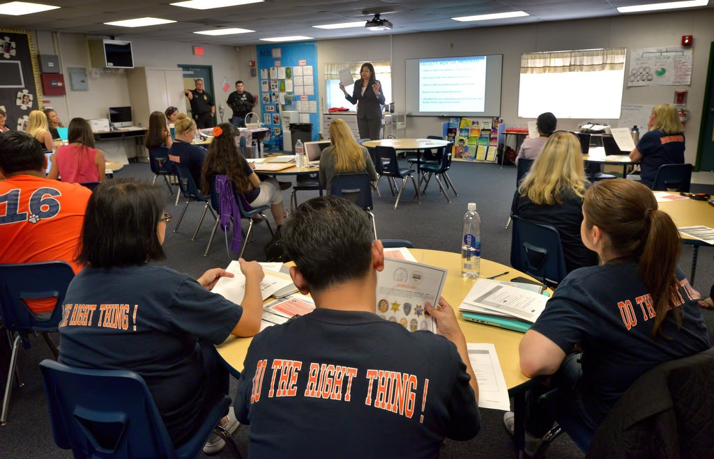 Deputy District Attorney Tamika Williams, talks to a group of local teachers and administrators at Valencia Park Elementary School about the GRIP (Gang Reduction Intervention Partnership) program which has the goal of preventing minors from becoming involved in local street gangs. Photo by Steven Georges/Behind the Badge OC