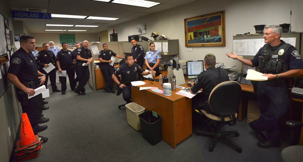 FPD officers, cadets and RSVPSs attend a briefing prior to the DUI checkpoint enforcement on Sept. 1. Photo by Steven Georges/Behind the Badge OC