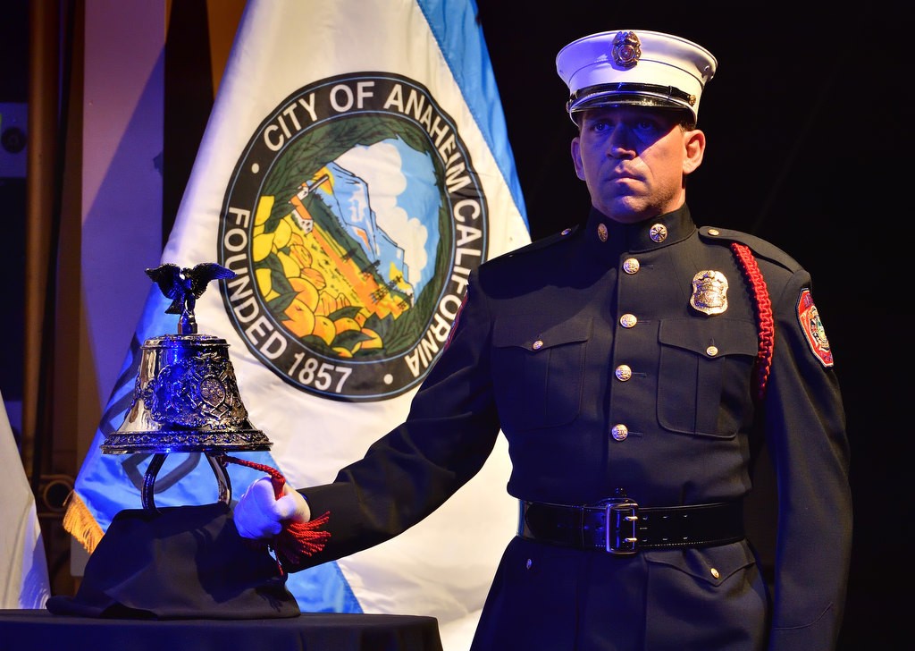The ringing of the bell, part of Last Alarm Ceremony for firefighters who gave their live in the line of duty, is performed during Anaheim’s 9-11 remembrance ceremony at the City National Grove of Anaheim. Photo by Steven Georges/Behind the Badge OC