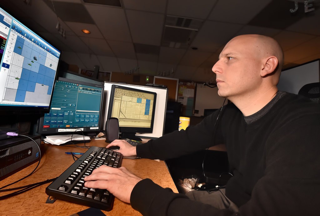 Bobby Lux, who wrote the book Dog Duty, works at Garden Grove PD as a police dispatcher. Photo by Steven Georges/Behind the Badge OC