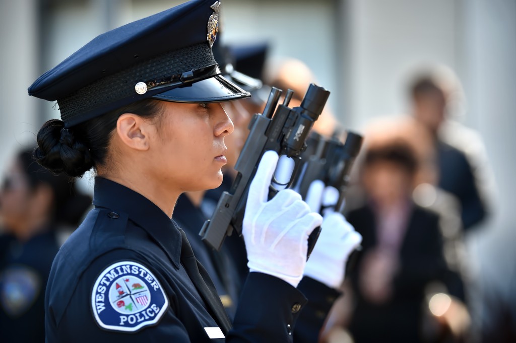 Westminster PD Recruit Frani Echavarria stands with her classmates for inspection before Golden West College Criminal Justice graduation ceremonies at Orange Coast College. Photo by Steven Georges/Behind the Badge OC