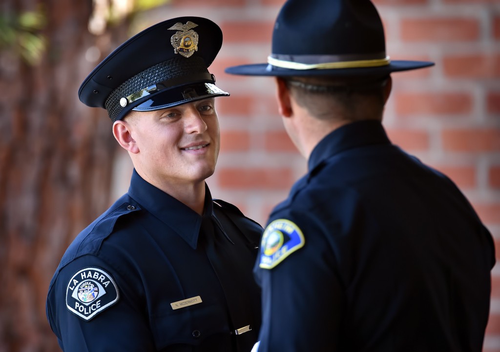 La Habra recruit Nicholas McDermott is congratulated by the Golden West College Criminal Justice Training Center academy instructors before the start of graduation ceremonies. Photo by Steven Georges/Behind the Badge OC
