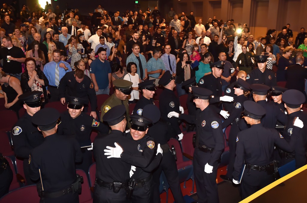 Golden West College Criminal Justice Training Center’s Basic Police Academy Class No. 152 congratulate each other at the conclusion of graduation ceremonies. Photo by Steven Georges/Behind the Badge OC