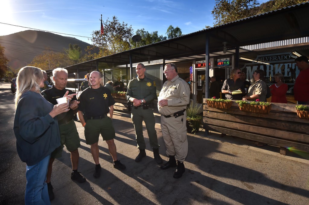 Members of the OCSD talks to local residents at Silverado Canyon Market during SDÕs Coffee with a Cop. Photo by Steven Georges/Behind the Badge OC