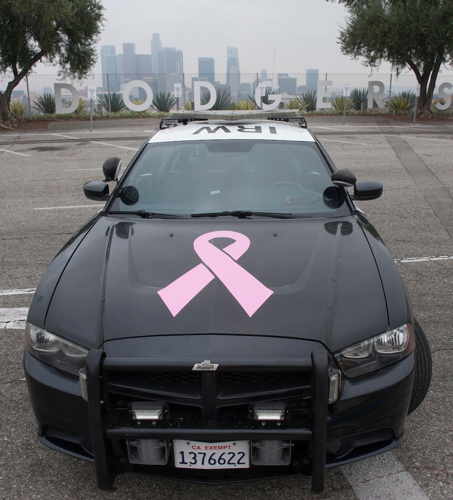 A cruiser from Irwindale displays the pink ribbon as part of the participation in Breast Cancer Awareness Month. About 40 Police Chiefs from various agencies in the state at Dodger Stadium to participate in the Pink Patch Project group photo Wednesday morning.
