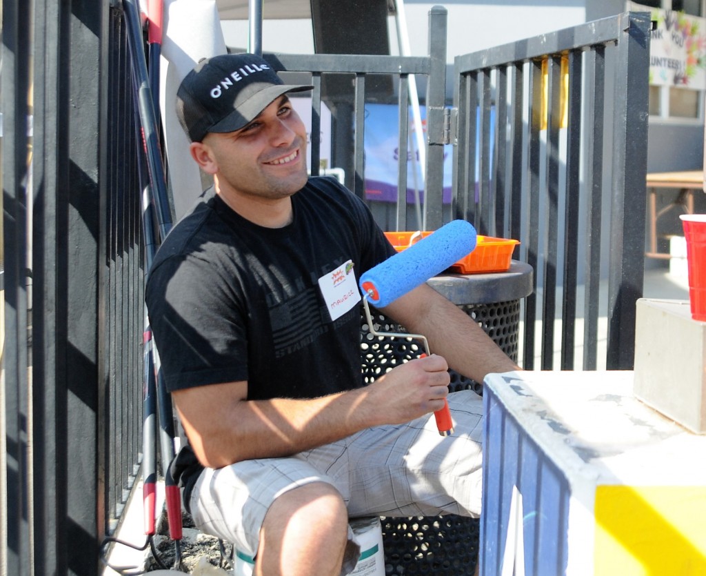  OCSD Deputy Maurice Bonilla took a break from painting duties during the playground building volunteer project at the Independencia Family Resource Center in Anaheim. Bonilla was among close to 40 OCSD volunteers. Photo by Lou Ponsi/ Behind the Badge OC