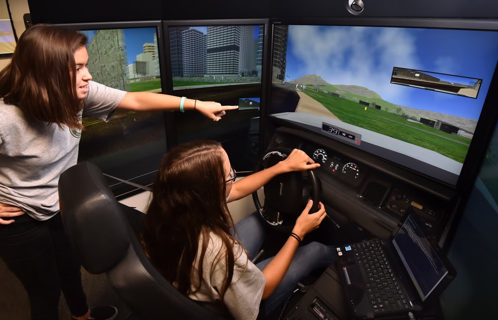 Zoey Lynd, 14, of Lake Forest at a police chase driving simulator at the Orange County Sheriff's Training Center. Photo by Steven Georges/Behind the Badge OC