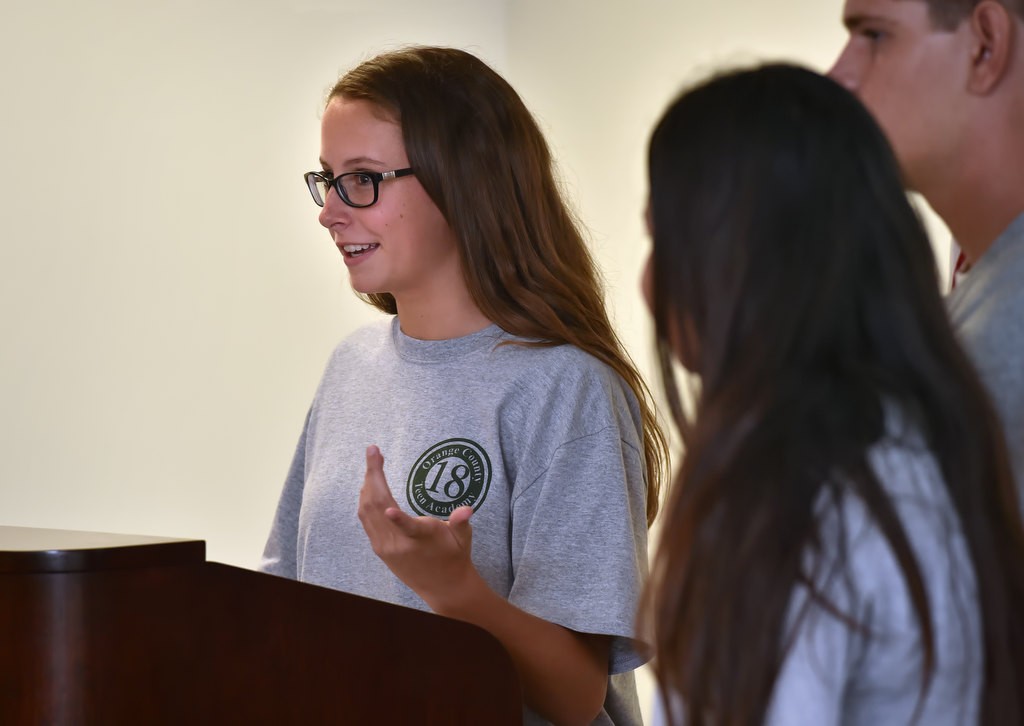 Zoey Lynd, 14, of Lake Forest, is the first of three students from the OC Sheriff’s first Youth Citizens’ Academy to address the class during their graduation ceremony. Photo by Steven Georges/Behind the Badge OC