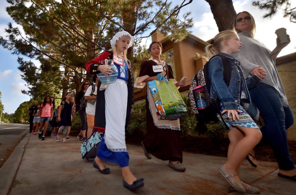 Students from Peters Canyon Elementary School walk to school with the Tustin PD. Photo by Steven Georges/Behind the Badge OC