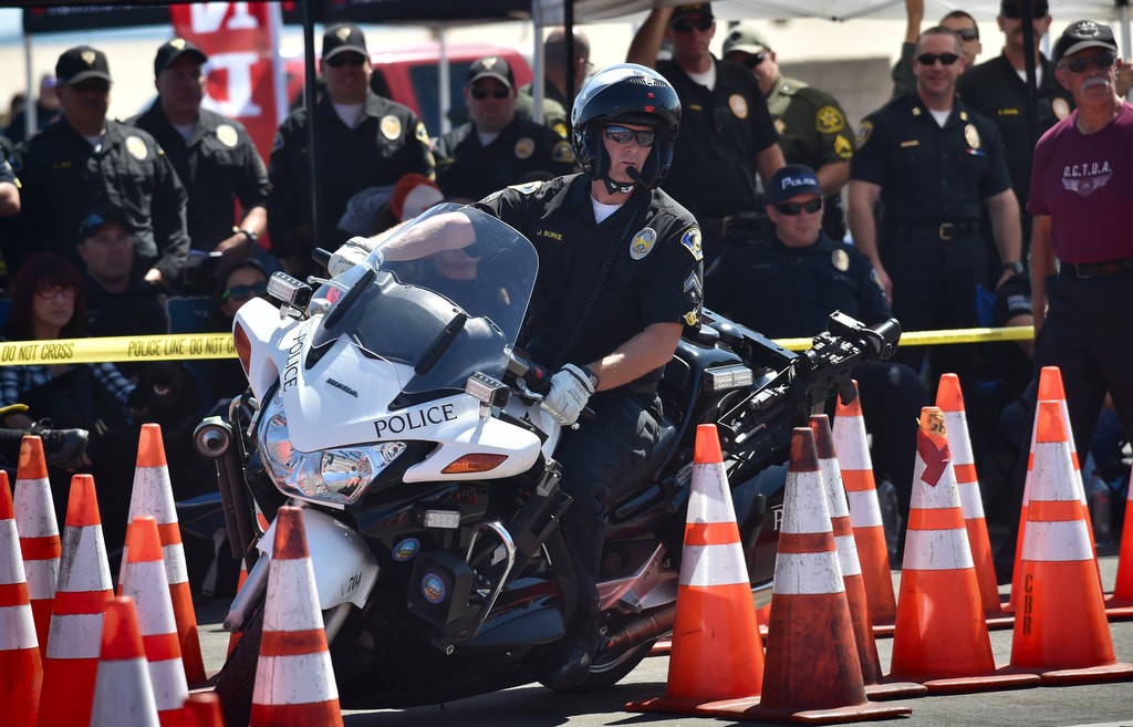 Anaheim PD Officer Jeff Burke competes during the 2016 OCTOA (Orange County Traffic Officers Association) Motor Rodeo at Huntington Beach. Photo by Steven Georges/Behind the Badge OC