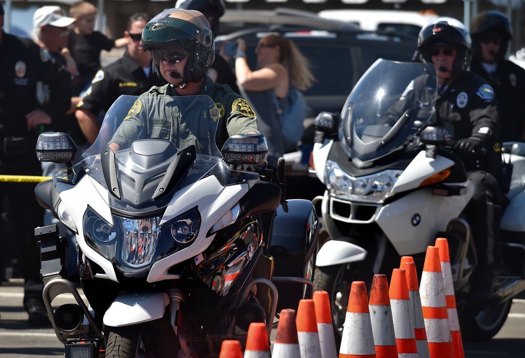 OCSDÕs Eric Gooselaw, left, during the 2016 OCTOA (Orange County Traffic Officers Association) Motor Rodeo at Huntington Beach. Photo by Steven Georges/Behind the Badge OC