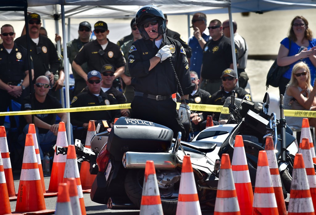 Anaheim PD’s Nathan Fay smiles at the conclusion of his run during the Top Gun portion of the 2016 OCTOA (Orange County Traffic Officers Association) Motor Rodeo at Huntington Beach. Photo by Steven Georges/Behind the Badge OC