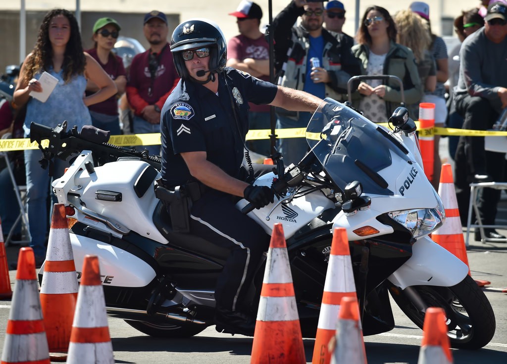 Tustin PD’s Jason Wonser competes during the 2016 OCTOA (Orange County Traffic Officers Association) Motor Rodeo at Huntington Beach. Photo by Steven Georges/Behind the Badge OC