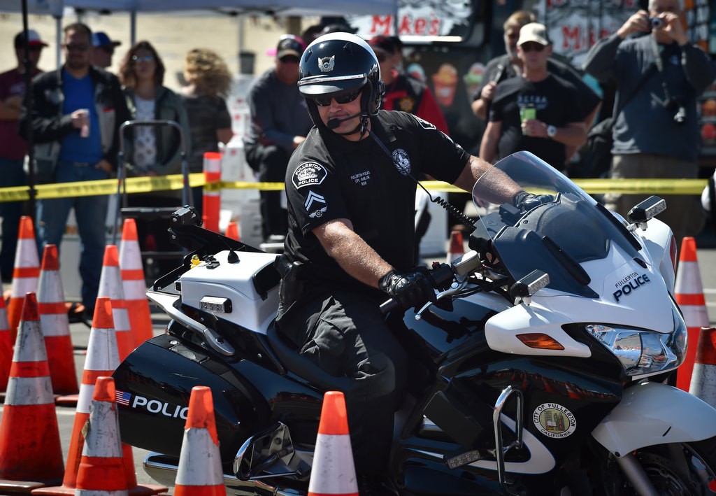 Fullerton PD Cpl. Stephen Bailor competes during the 2016 OCTOA (Orange County Traffic Officers Association) Motor Rodeo at Huntington Beach. Photo by Steven Georges/Behind the Badge OC