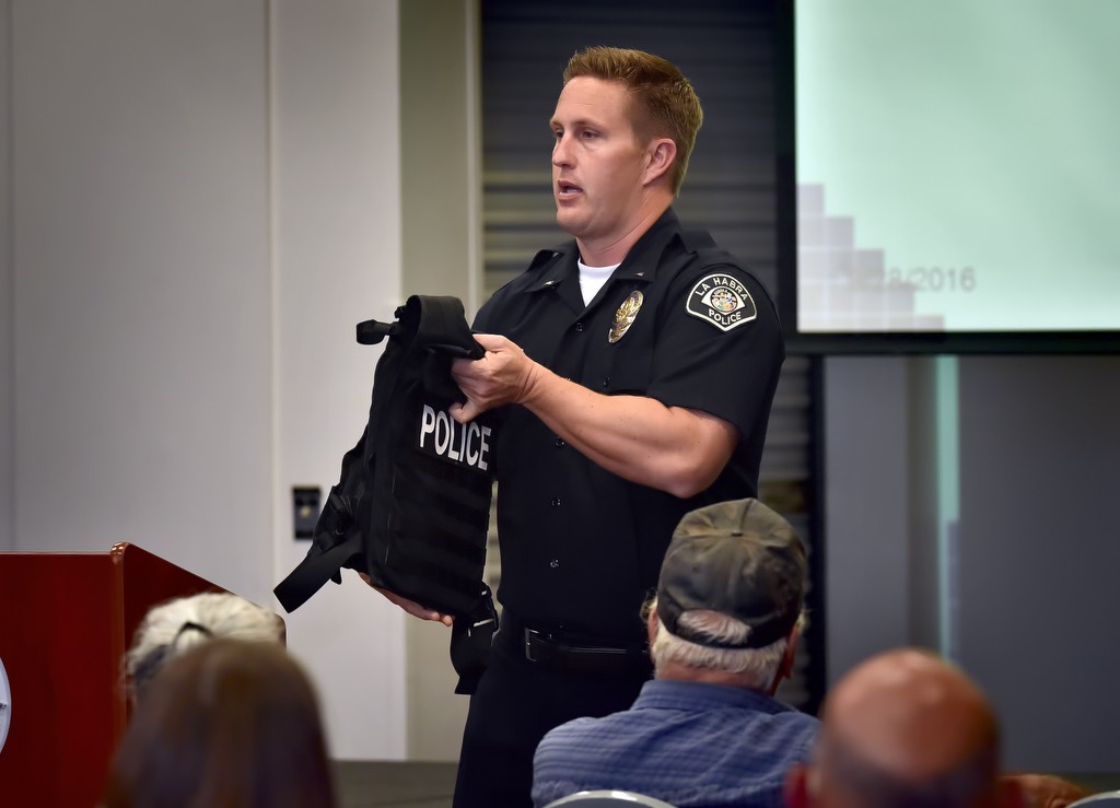 La Habra PD Lt. Adam Foster talks about how officers respond when an active shooter call is made during a community meeting on emergency preparedness at the La Habra Community Center. Photo by Steven Georges/Behind the Badge OC