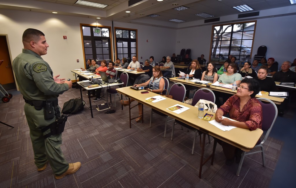 La Habra PD Officer Ricardo Rodriguez teaches a Spanish speaking Citizens' Academy class. Photo by Steven Georges/Behind the Badge OC