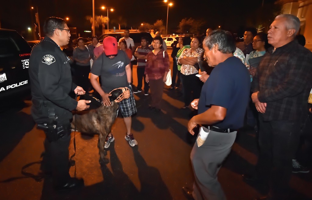 La Habra PD Officer Amsony Mondragon allows students from a Spanish speaking Citizens Academy class pet his K-9 partner, Renzo, during a police dog demonstration. Photo by Steven Georges/Behind the Badge OC