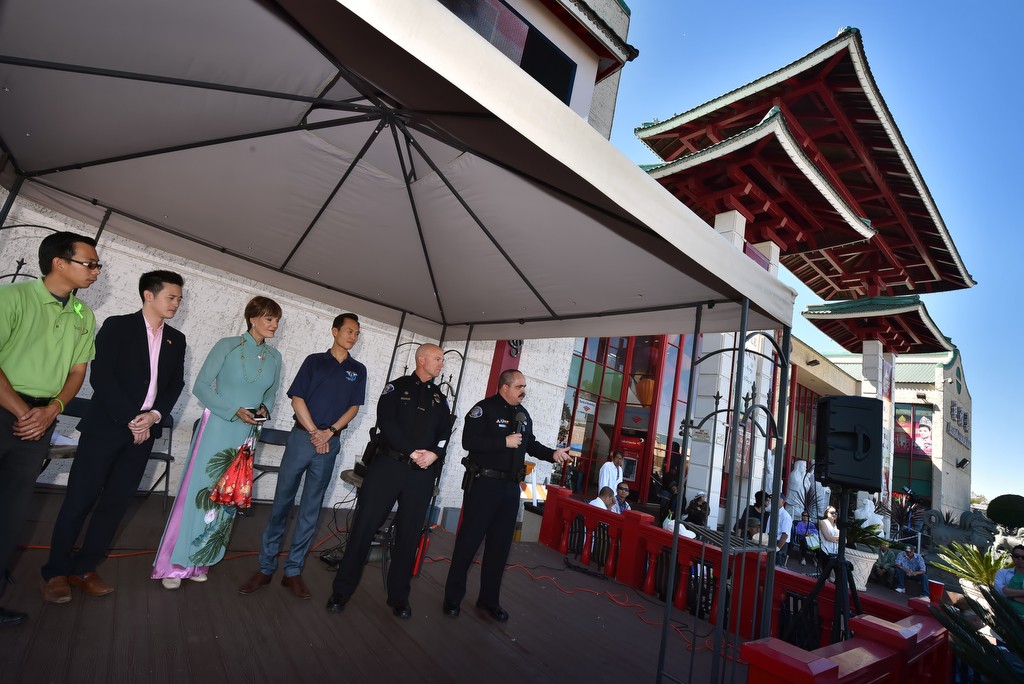 Garden Grove PD Capt. Travis Whitman and Westminster PD Cmdr. Mike Chapman, right, talk to the Vietnamese community with Paul Hoang, left, Karl Truong, candidate for Westminster School Board, Westminster Councilwoman Diana Lee Carey and Garden Grove Mayor Bao Nguyen, during the Viet-CARE Pho-Covery Celebration at the Asian Garden Mall in Westminster. Photo by Steven Georges/Behind the Badge OC
