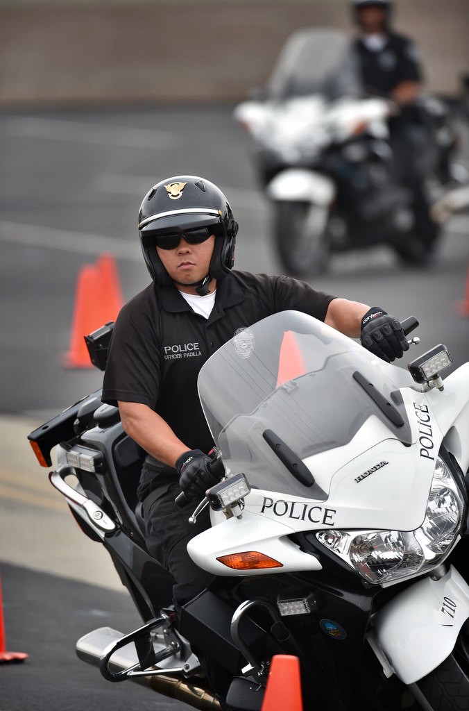 Anaheim PD Motor student Officer Mike Padilla runs through a course during motor school. Photo by Steven Georges/Behind the Badge OC