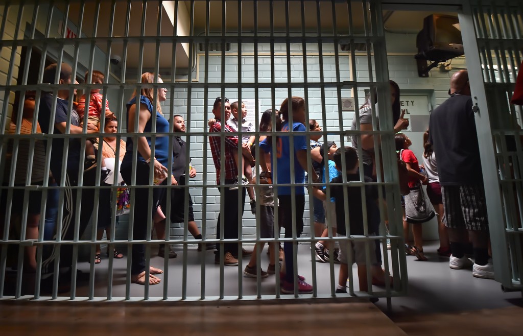 Parents and kids alike checkout La Habra PD’s jail during a tour for the department’s open house. Photo by Steven Georges/Behind the Badge OC