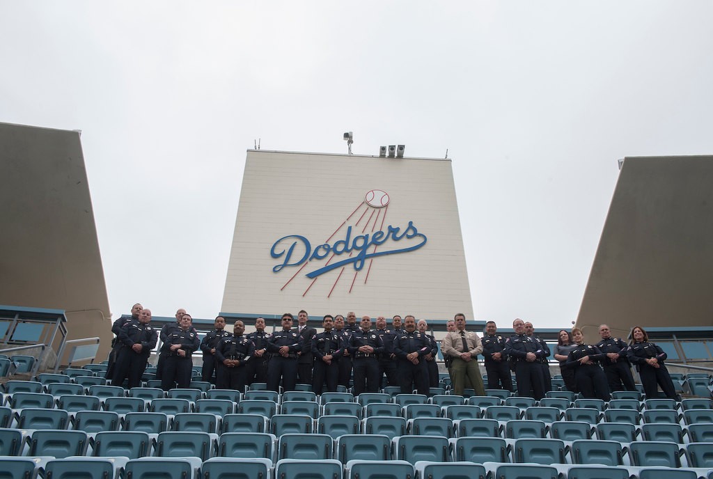 About 40 Police Chiefs from various agencies in the state inside Dodger Stadium to participate in the Pink Patch Project group photo Wednesday morning.