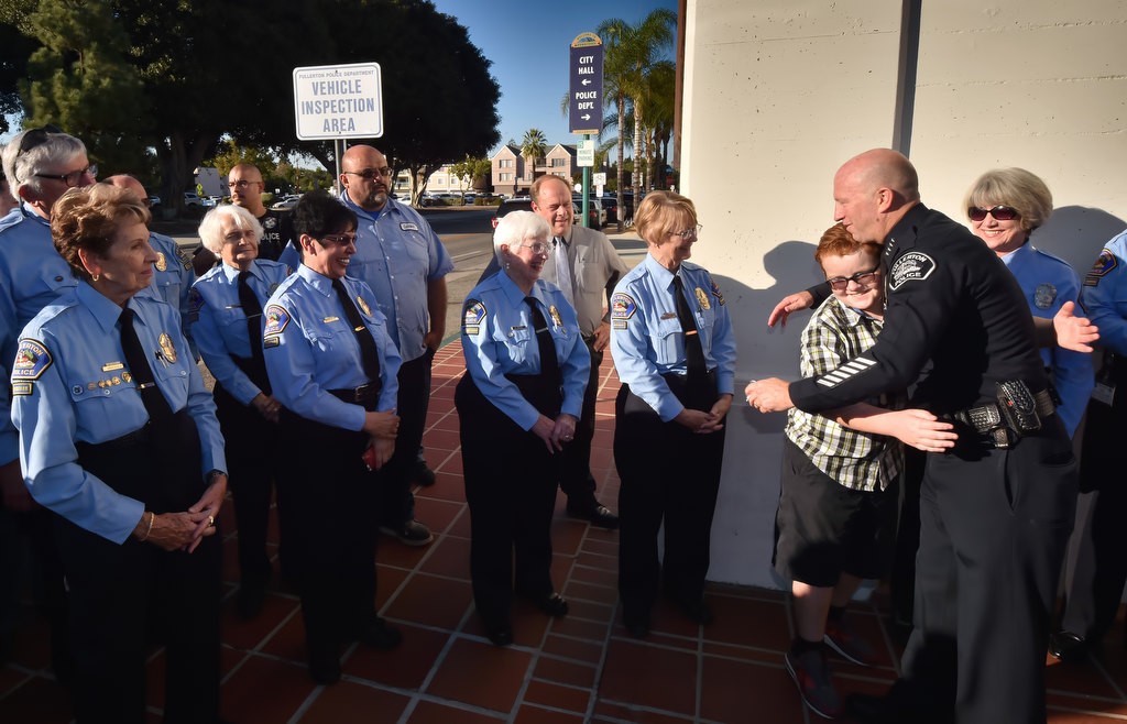Police Chief Dan Hughes moves down the Walk of Honor during his retirement ceremony. Photo by Steven Georges/Behind the Badge OC