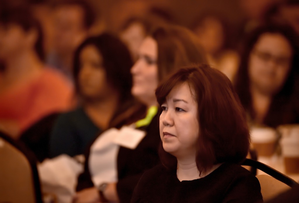 Attendees of the 12th Annual Community First Conference listen closely as Jodi Barber talks about her son who died from drug use. Photo by Steven Georges/Behind the Badge OC