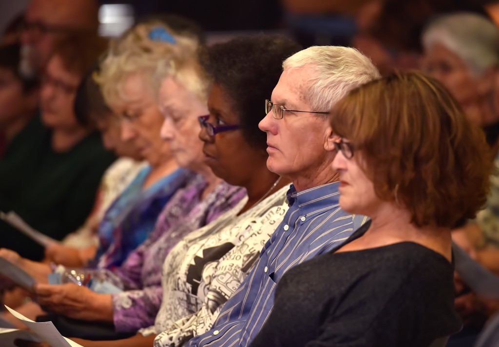 Tustin residents listen to the Tustin police chief during the Tustin fall community safety meeting at the Tustin Community Center. Photo by Steven Georges/Behind the Badge OC