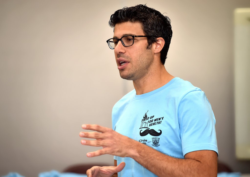 Dr. Faysal Yafi, director of men’s health for UC Irvine Health, talks to Anaheim Fire & Rescue employees about men’s health issues during a education talk at the North Net Training Center in Anaheim. Photo by Steven Georges/Behind the Badge OC