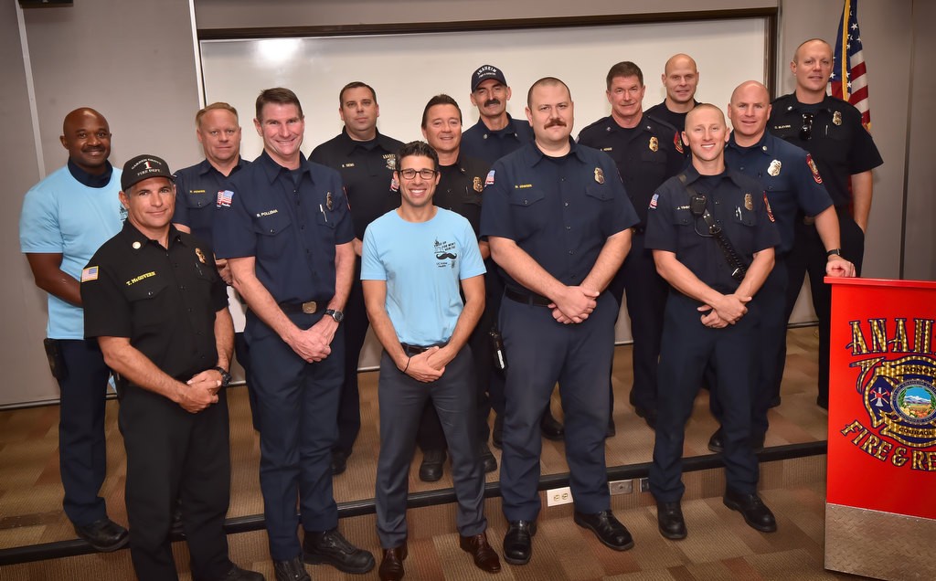 Members of Anaheim Fire & Rescue gather at the North Net Training Center after an education talk about mens health issues. Photo by Steven Georges/Behind the Badge OC