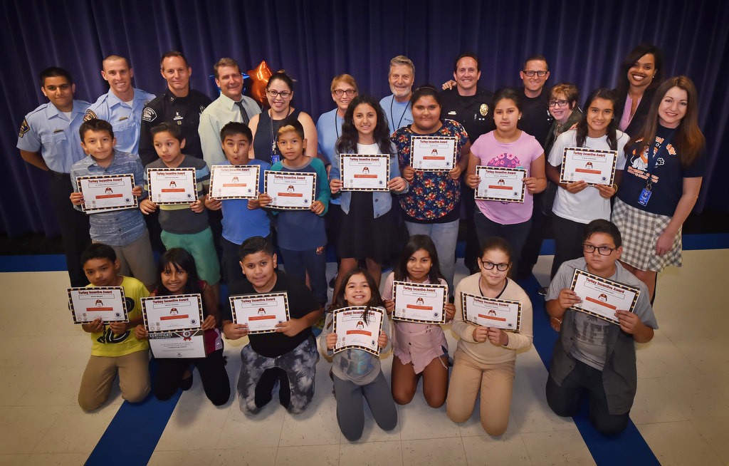 Valencia Park Elementary School students being honored by the GRIP program and the Fullerton PD gather at the school with their certificates. Photo by Steven Georges/Behind the Badge OC
