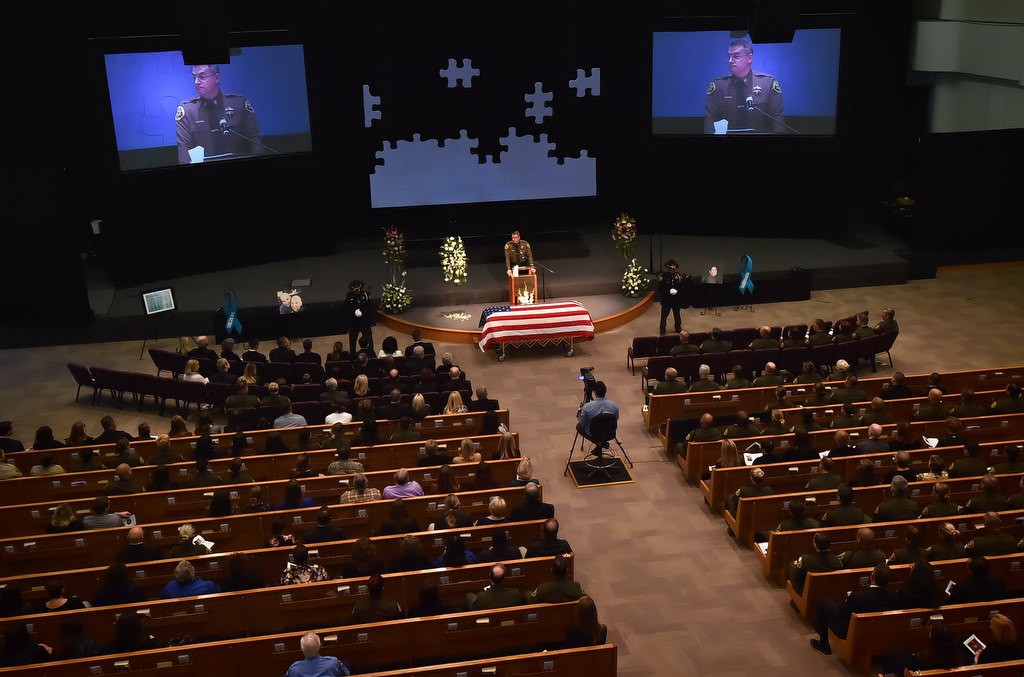 Family and friends gather at Crossline Community Church in Laguna Niguel as OC Sheriff Captain Jason Park talks about the life of Deputy Courtney Ward during a memorial service. Photo by Steven Georges/Behind the Badge OC