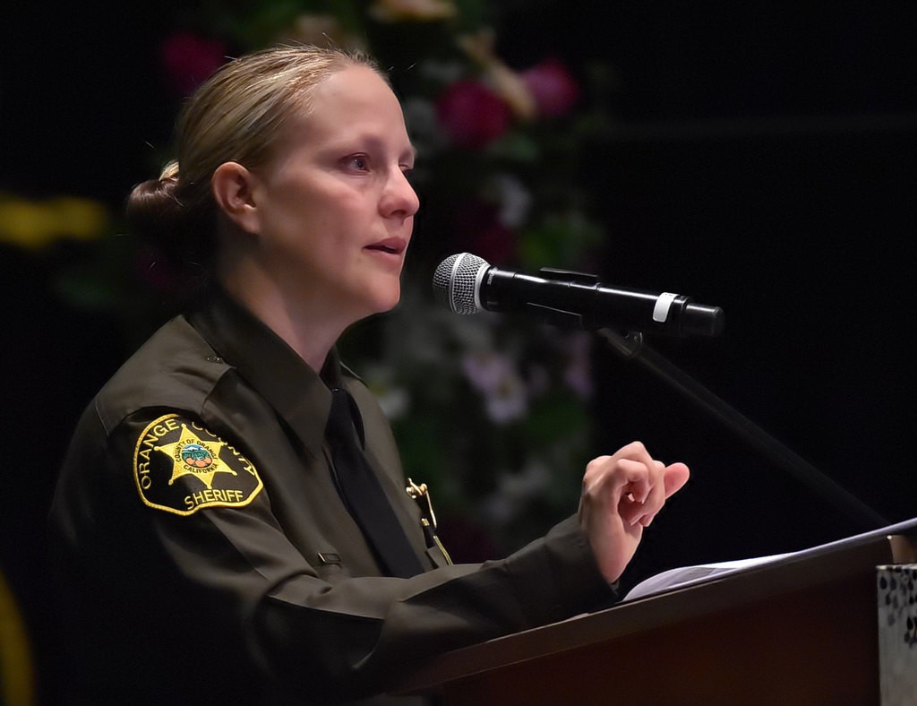 OC Sheriff Deputy De Anne Wigginton talks about how Deputy Courtney Ward touched her life during a memorial service at Crossline Community Church. Photo by Steven Georges/Behind the Badge OC
