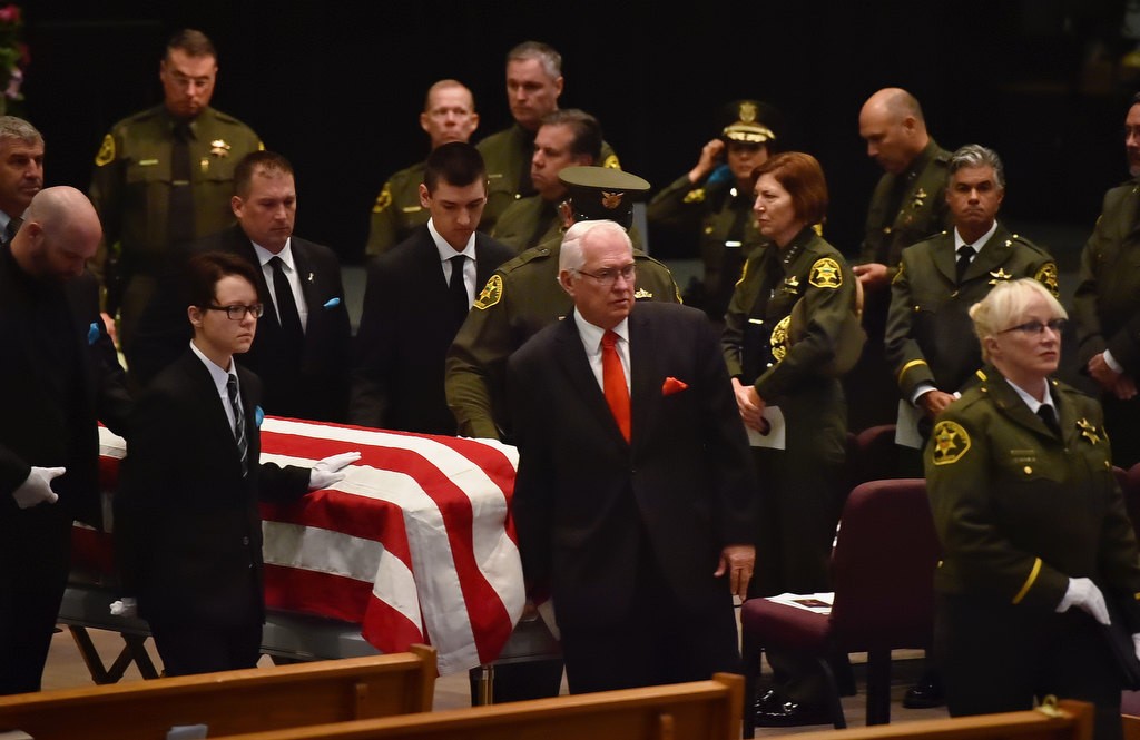 Deputy Courtney Ward’s casket is carried out of the church at the conclusion of funeral services. Photo by Steven Georges/Behind the Badge OC