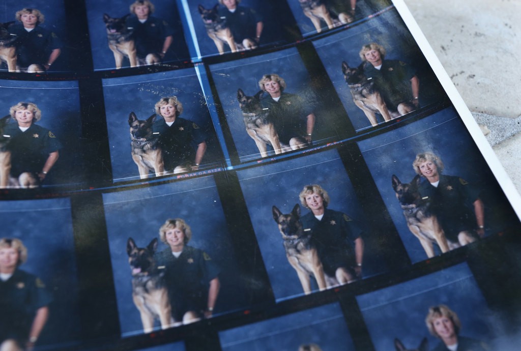Contact sheet of photos from 1982 of Elizabeth Dove and her K9 partner. Photo by Christine Cotter