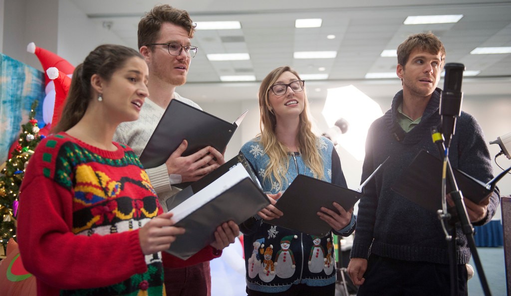 The Jollys, Roxana Meyers, left, Brad Nol, Sarah Remley and Nathan Kersey-Wilson perform at Monday's annual party for burn survivors at the Anaheim Convention Center put on by the UC Irvine Health Regional Burn Center.