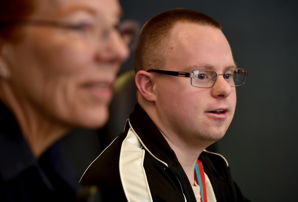 John Blalock, 28 of La Habra, talks about his experience as a Special Olympic athlete on the swim team. Photo by Steven Georges/Behind the Badge OC