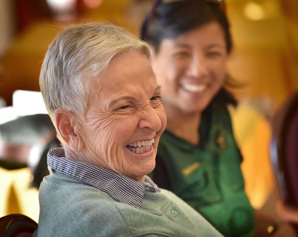 Alice Chandler, Orange County’s first female sheriff deputy, tells stories about her life to other female deputies. Photo by Steven Georges/Behind the Badge OC