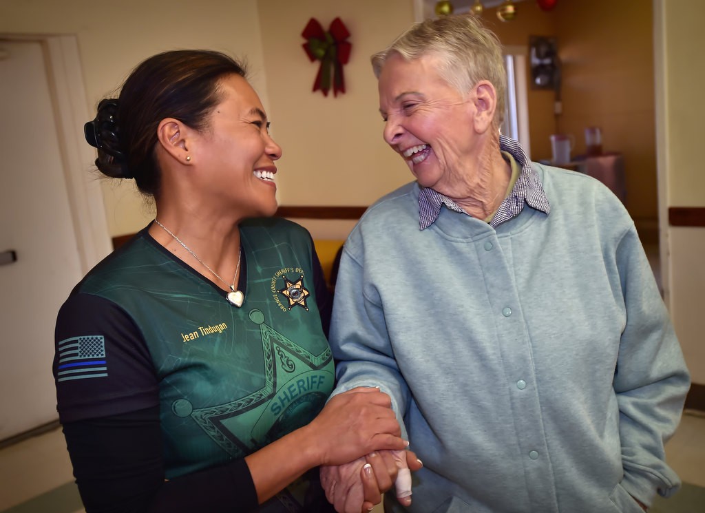 OC Sheriff Special Officer Jean Tindugan with Alice Chandler, OCSD’s first female sheriff deputy. Photo by Steven Georges/Behind the Badge OC