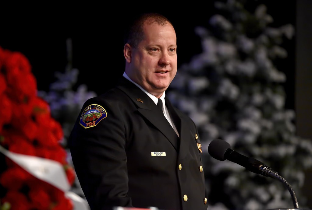 OCFA Chaplain Jim Gwaltney says a few words for Santa Ana/OCFA Firefighter Ron Castro during his memorial service. Photo by Steven Georges/Behind the Badge OC