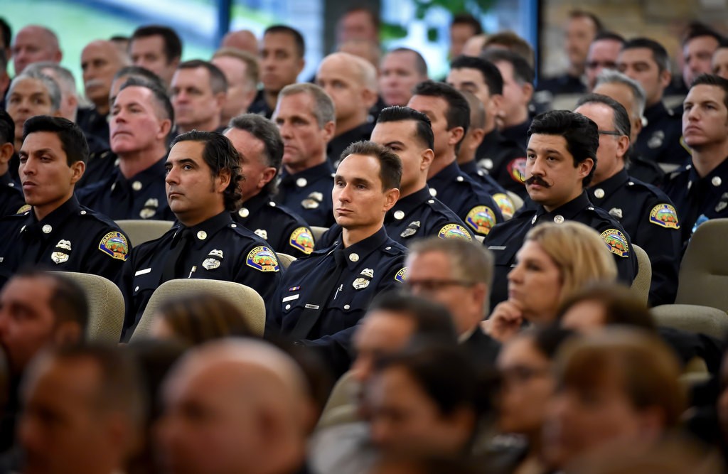 Members of the OCFA (Orange County Fire Authority) gather with family and friends at Calvary Chapel in Santa Ana for the memorial service of Santa Ana/OCFA Firefighter Ron Castro. Photo by Steven Georges/Behind the Badge OC