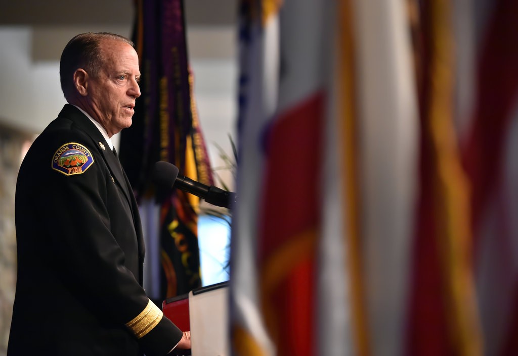 OCFA Fire Chief Jeff Bowman talks about Santa Ana/OCFA Firefighter Ron Castro during a memorial service for Castro at Calvary Chapel in Santa Ana. Photo by Steven Georges/Behind the Badge OC