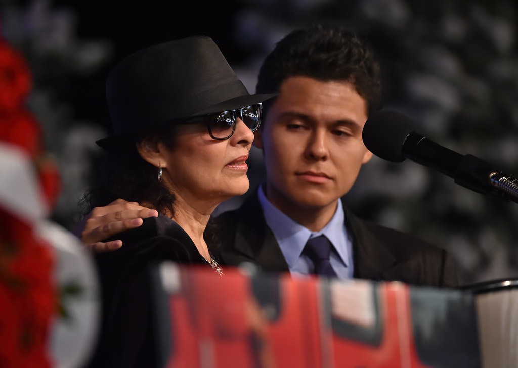 Cyndy Castro and Keo Castro, sister and nephew of Ron Castro, talk about their brother and uncle during his memorial service at Calvary Chapel in Santa Ana. Photo by Steven Georges/Behind the Badge OC