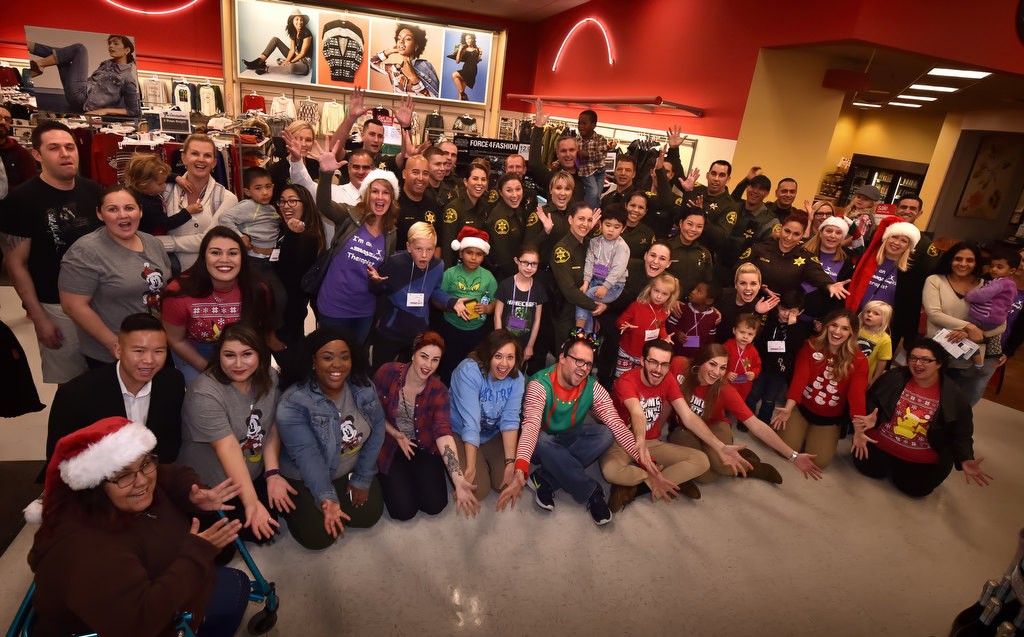 Deputies with the OC Sheriff Department gather with special needs children from aMAYZing Kids and Target employees at the Target store in Foothill Ranch for the Shop with a Deputy event. Photo by Steven Georges/Behind the Badge OC