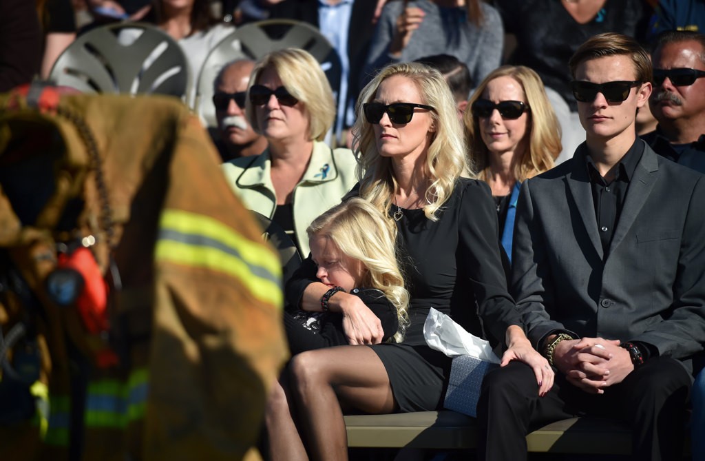 Ken Gabrielson talks about OCFA Capt. Eric Weuve during a memorial service at the base of the Huntington Beach Pier. Photo by Steven Georges/Behind the Badge OC