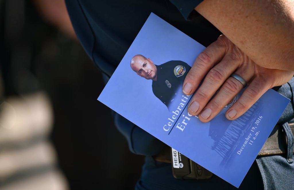 Ken Gabrielson talks about OCFA Capt. Eric Weuve during a memorial service at the base of the Huntington Beach Pier. Photo by Steven Georges/Behind the Badge OC